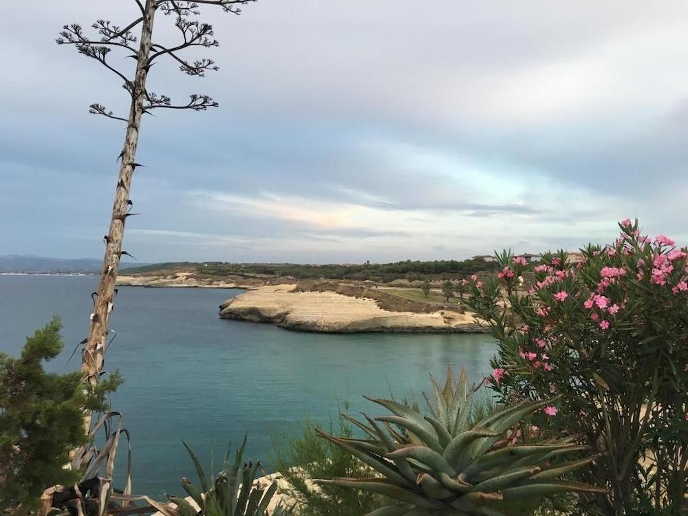 Hotel Libyssonis Porto Torres Bagian luar foto